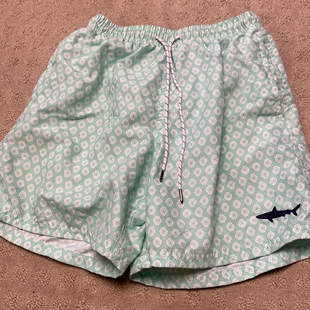 Mens swim trunks size S .Aqua Green and white design .